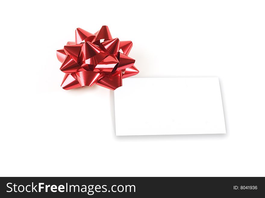 White note of white background with red ribbon