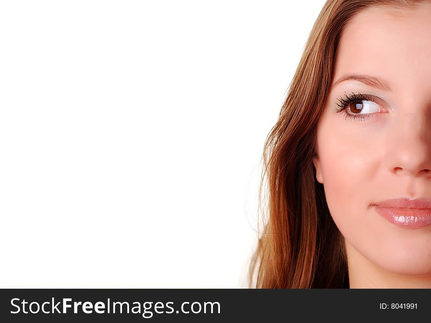 Face of a beautiful young woman isolated at white background. Face of a beautiful young woman isolated at white background