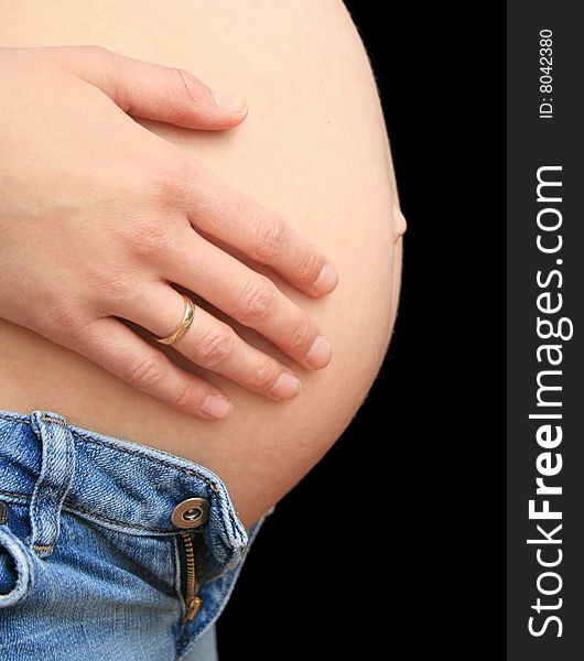 Pregnant woman touching her belly. Pregnant woman touching her belly