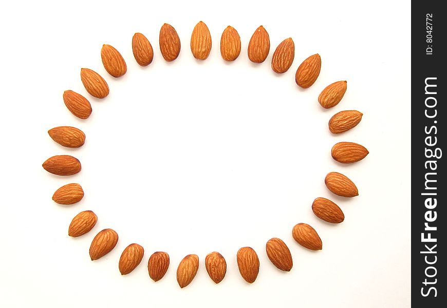 Pattern of almond on the white background