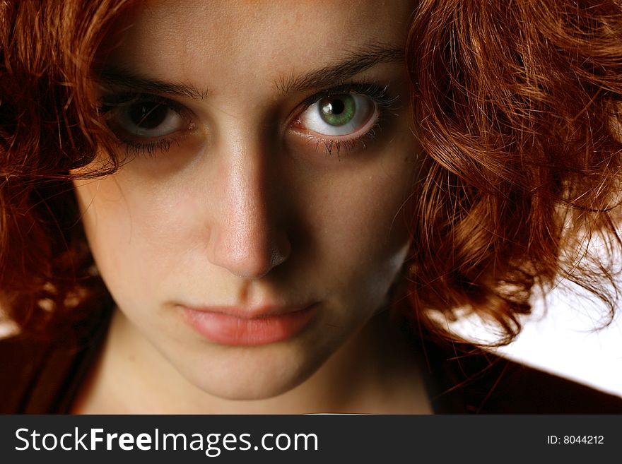 Closeup of a beautiful woman green eyes