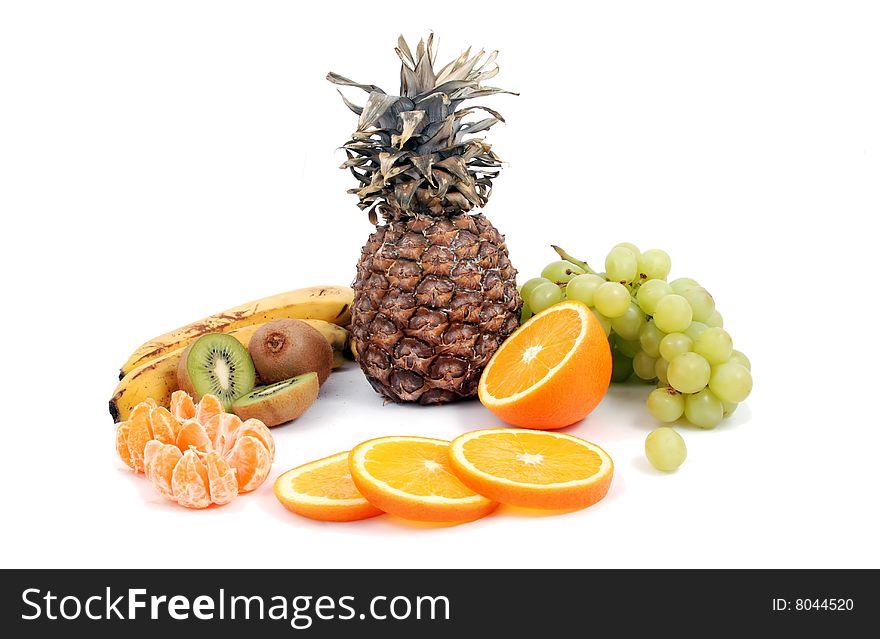 Assorted fruits: kiwi, grapes, pineapple...