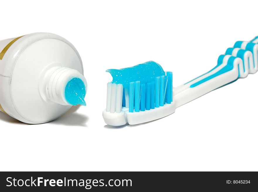 Tooth-paste and brush  isolated on the white background