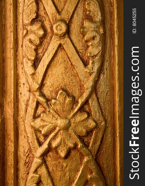 Detail of carved gold wood decorative trim. Detail of carved gold wood decorative trim.