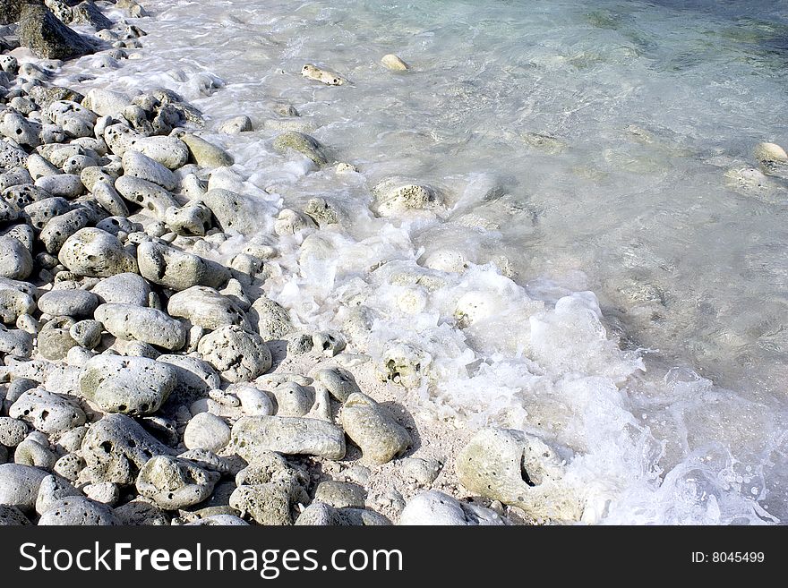 Background with grey stones and water. Background with grey stones and water