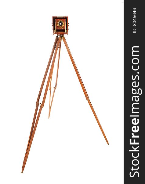 Very Old Camera on a wooden tripod on a white background