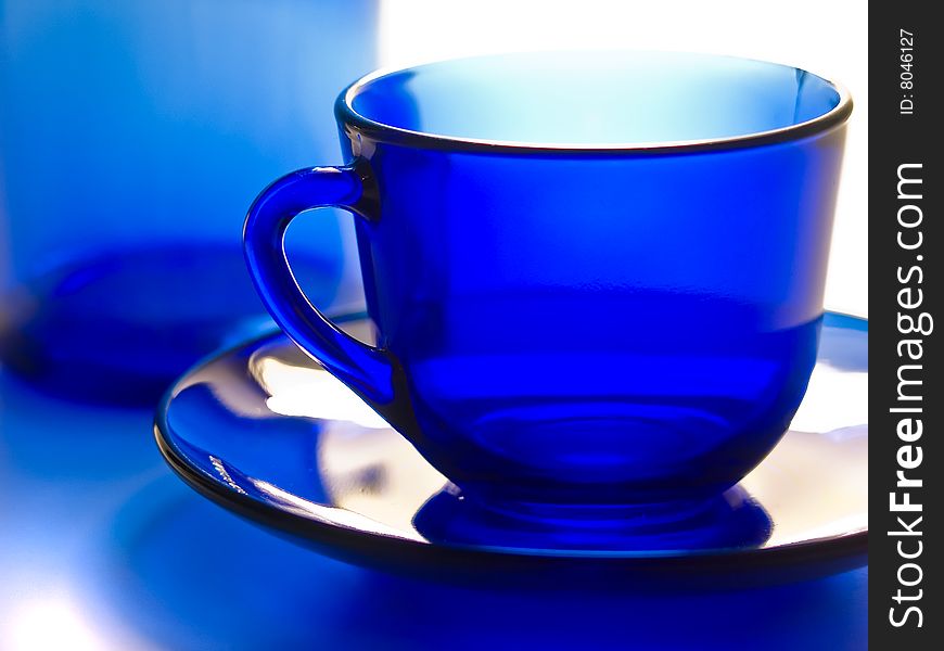 Blue transparent cup with plate