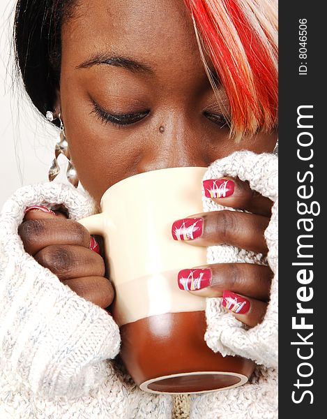 An pretty woman from Jamaica with nice colored hair having a hot coffee
in the winter. An pretty woman from Jamaica with nice colored hair having a hot coffee
in the winter.