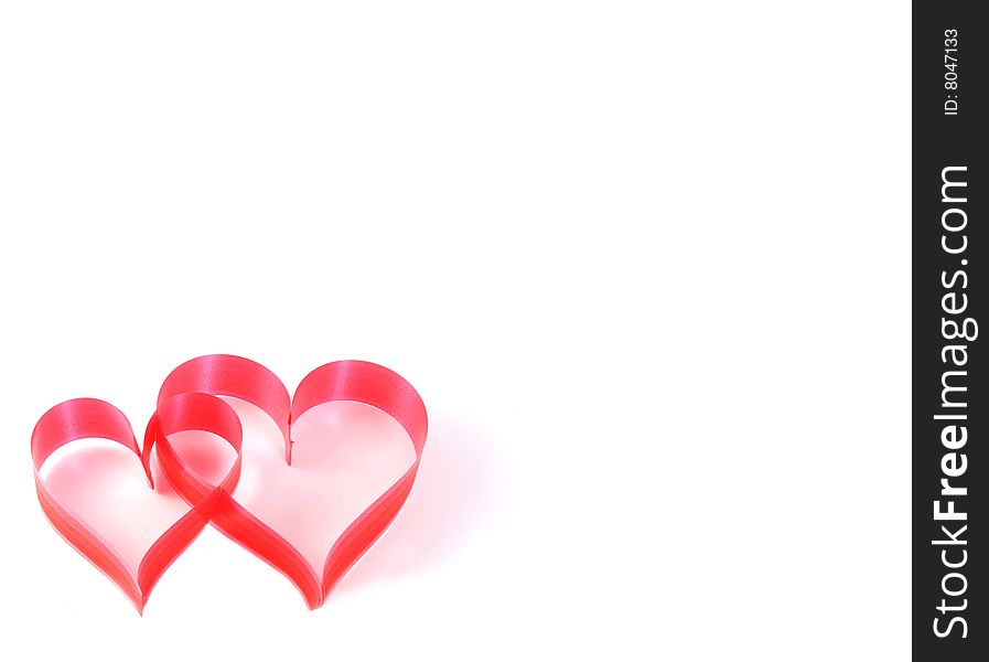 Background with hearts from a tape of red color.