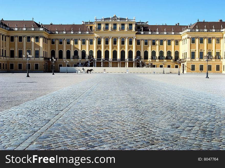 Cobblestone square and palace in Prague