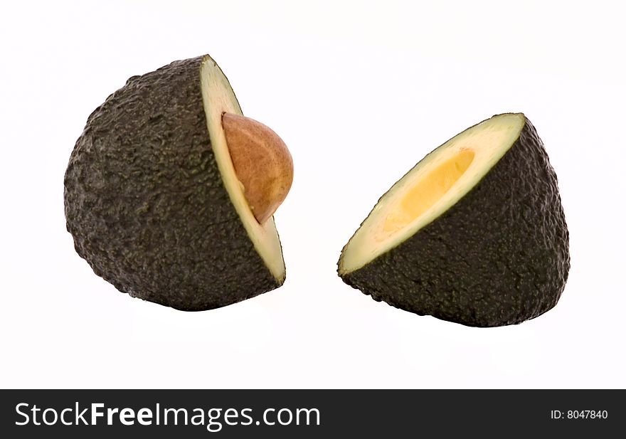 Sections of avocado isolated on white background
