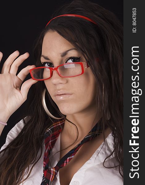 Beautiful sexy brunette  holding red glasses. Beautiful sexy brunette  holding red glasses