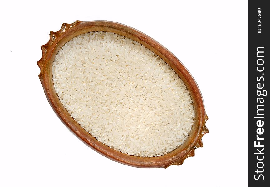 Rice in brown earthenware isolated on white background