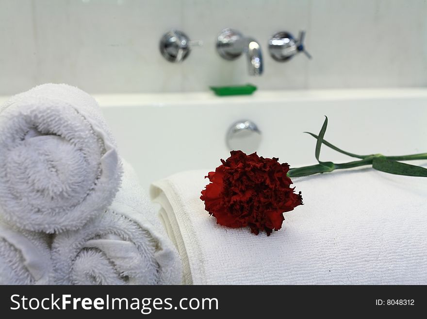 White bathtub with towel in bath room