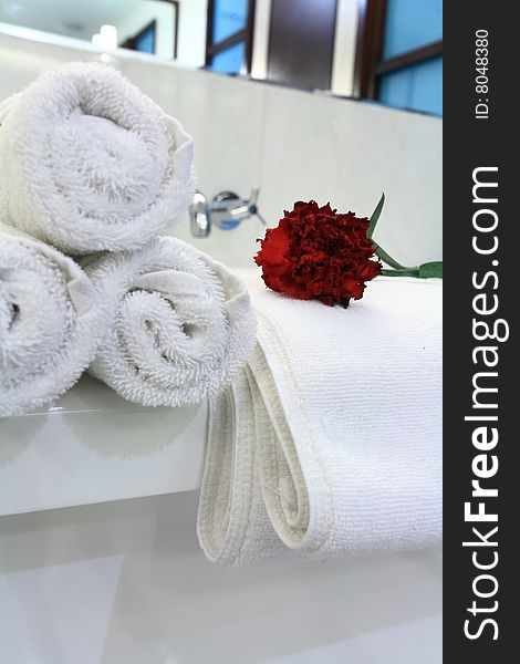 White bathtub with towel in bath room