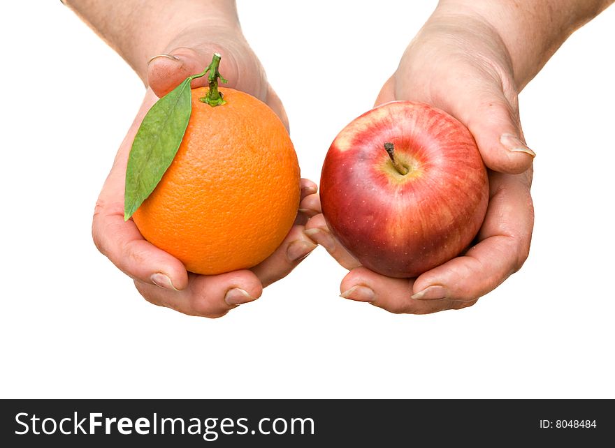 Apple and orange in hands
