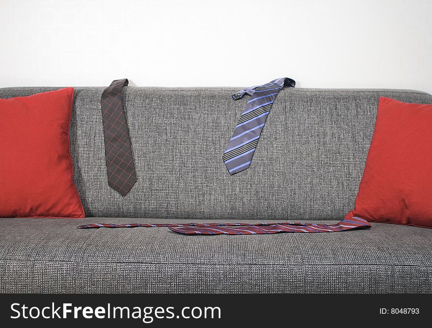 Ties hanging on a sofa. Ties hanging on a sofa