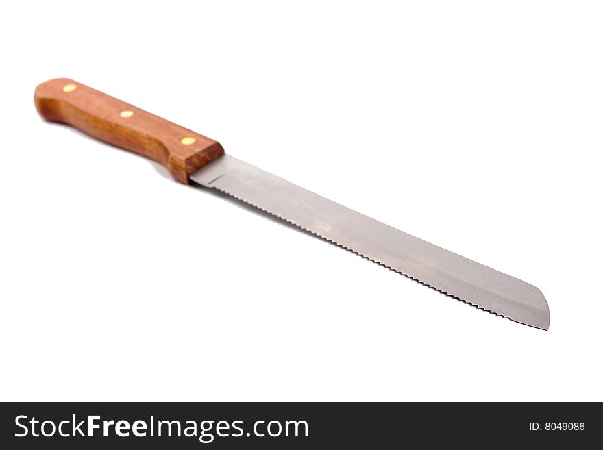 Kitchen knife isolated on white, focus at top of knife