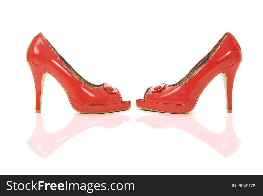 Red shoes with reflection