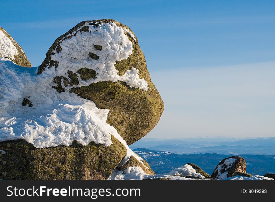 Stone with snow in beautiful winter mountains. Stone with snow in beautiful winter mountains