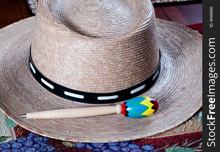 A native hat and a pen. A native hat and a pen
