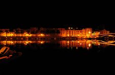 Mediterranean Town Along River Bank At Night. Stock Photo Mediterranean Town Along River Bank At Night. Stock Photo