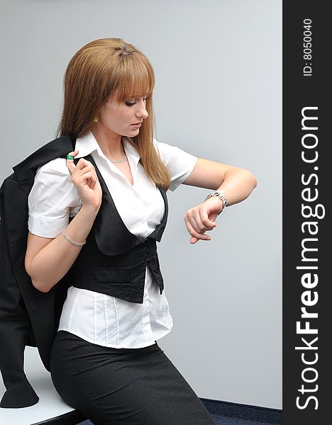 Posing young business woman. Wearing black jacket.