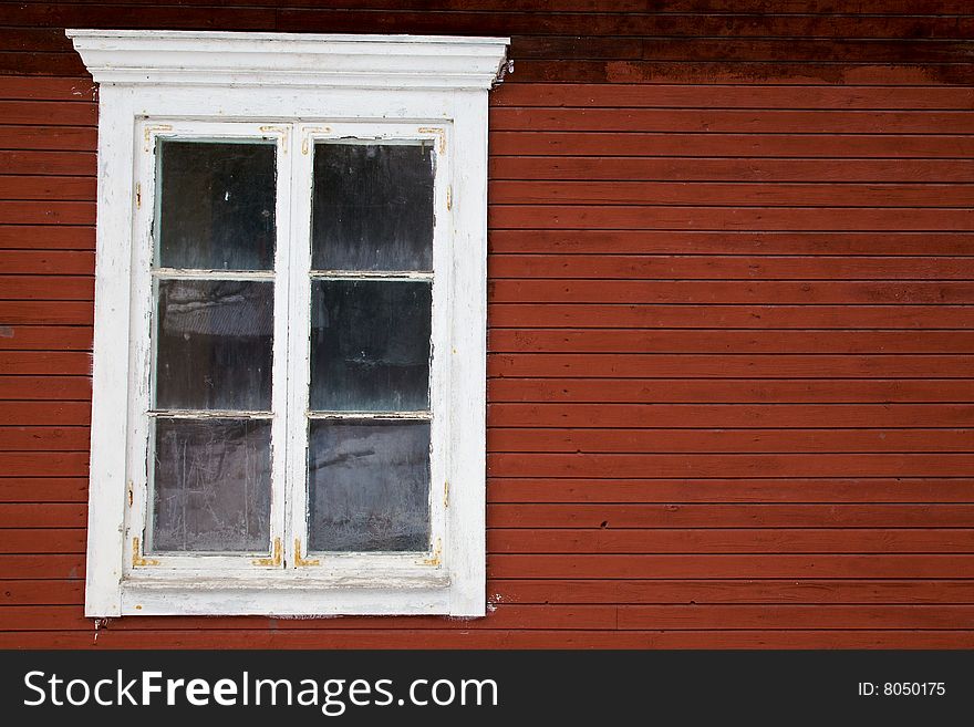 Window in red wooden wall, can be used for copy text. Window in red wooden wall, can be used for copy text