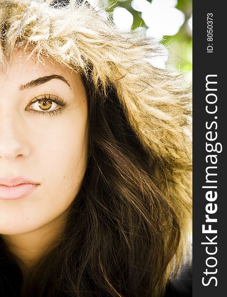 Woman portrait wearing a fur cap.