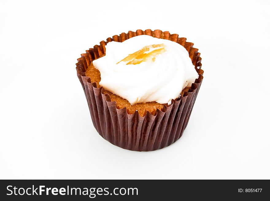 A cream cup cake isolated on white. A cream cup cake isolated on white