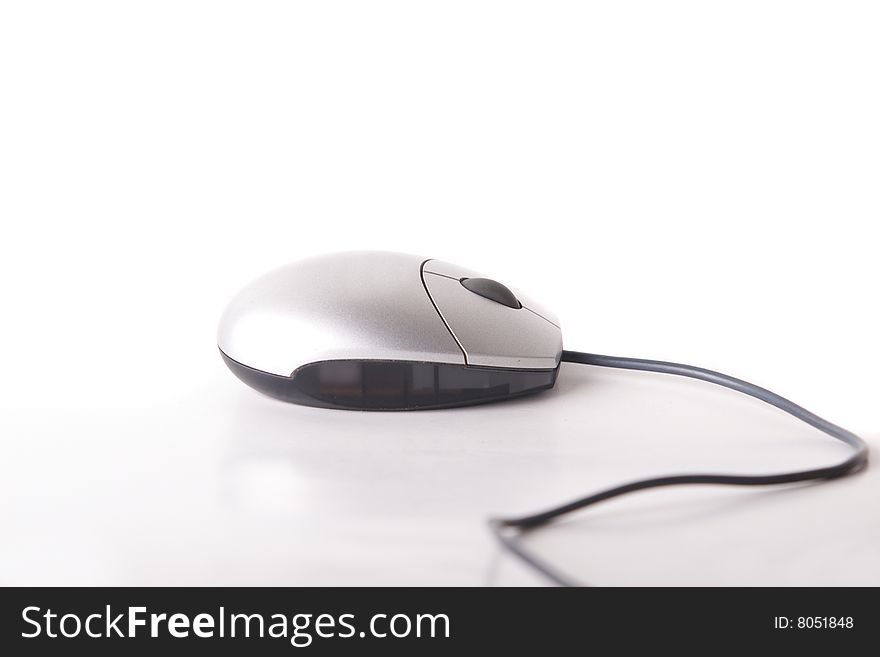 Computer mouse with cable on white background. Isolated over white.