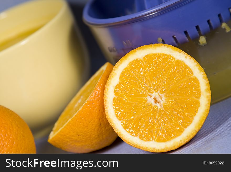 Fresh oranges and orange juice