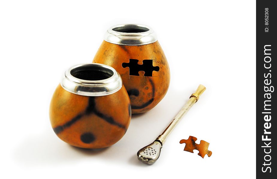 Two yerba mate gourds with missing puzzle element isolated on white