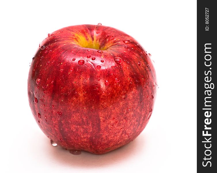 A whole red apple on white background.