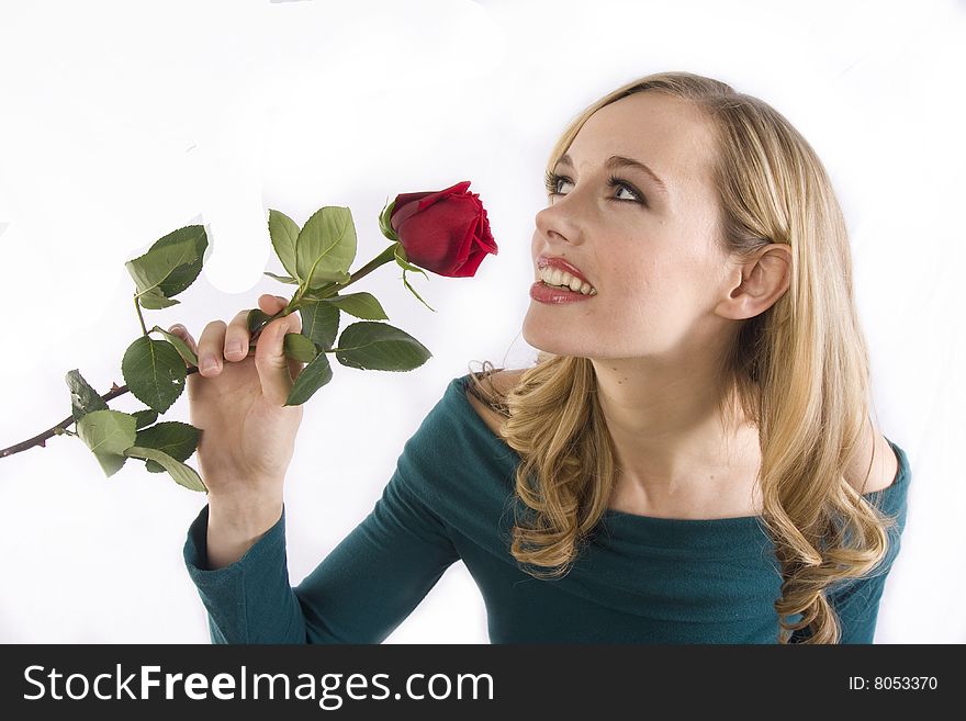 Pretty Girl Smelling Rose