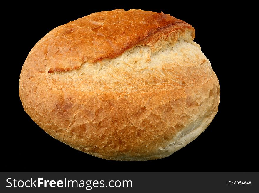 White bread loaf on a black background