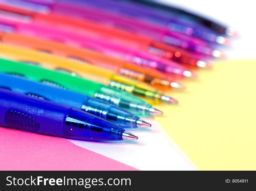Plastic pens of different colors - closeup. Plastic pens of different colors - closeup