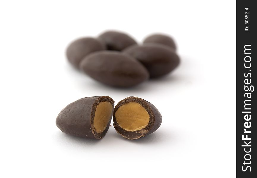 Nut in chokolate isolated on white background