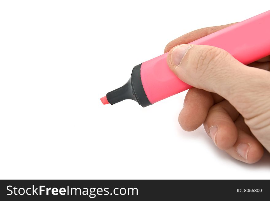 Pink marker in hand on white background