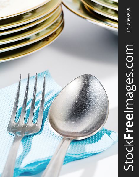 Stock photo: an image of a spoon and a fork with plates. Stock photo: an image of a spoon and a fork with plates