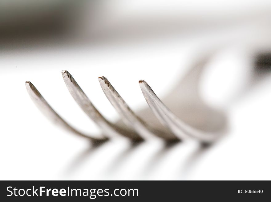 Stock photo: food theme: an image of silver fork on a table