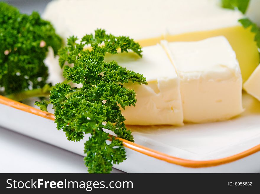Stock photo: an image of yellow butter on a plate