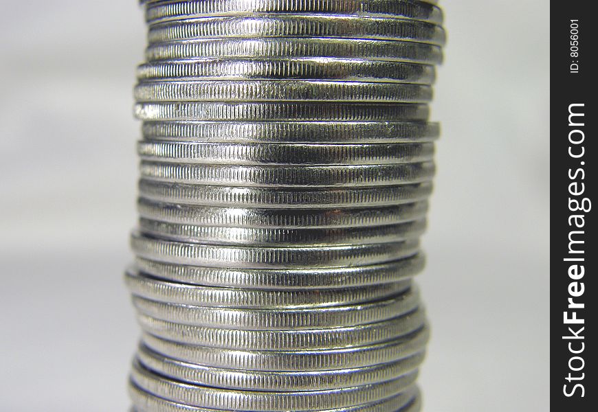 Pile folded coins. Coins stock