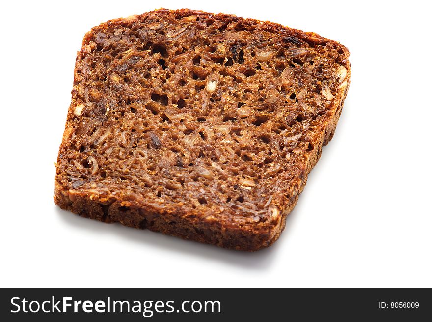 One piece of rye bread isolated on a white background.