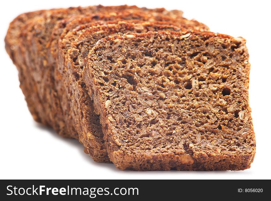 Pieces of cut bread isolated on a white background.