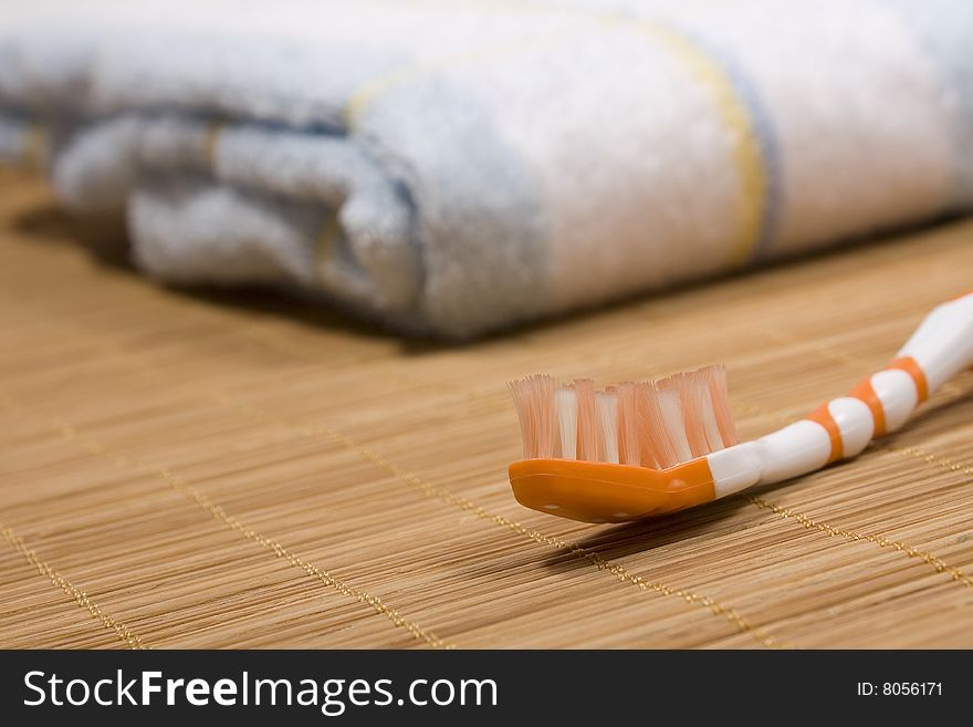 Tooth-brush and a towel.