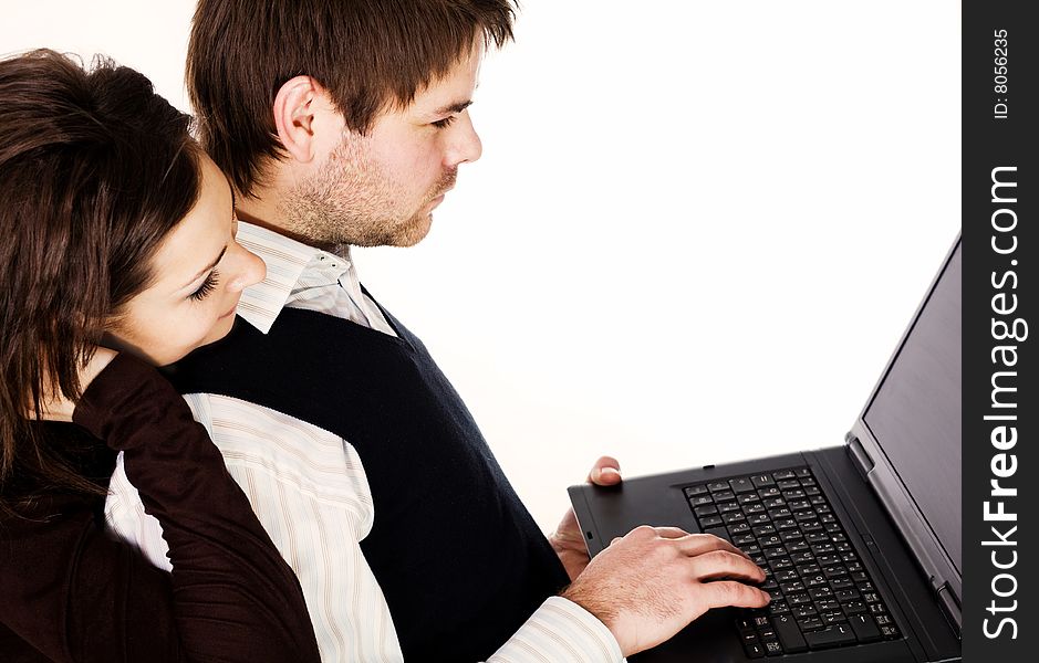 Stock photo: business theme: an image of a couple with laptop