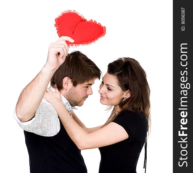 Stock photo: love theme: an image of a happy couple with a heart