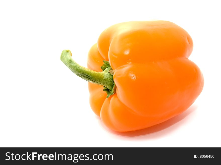 Pepper with a green pod on a white background. Pepper with a green pod on a white background