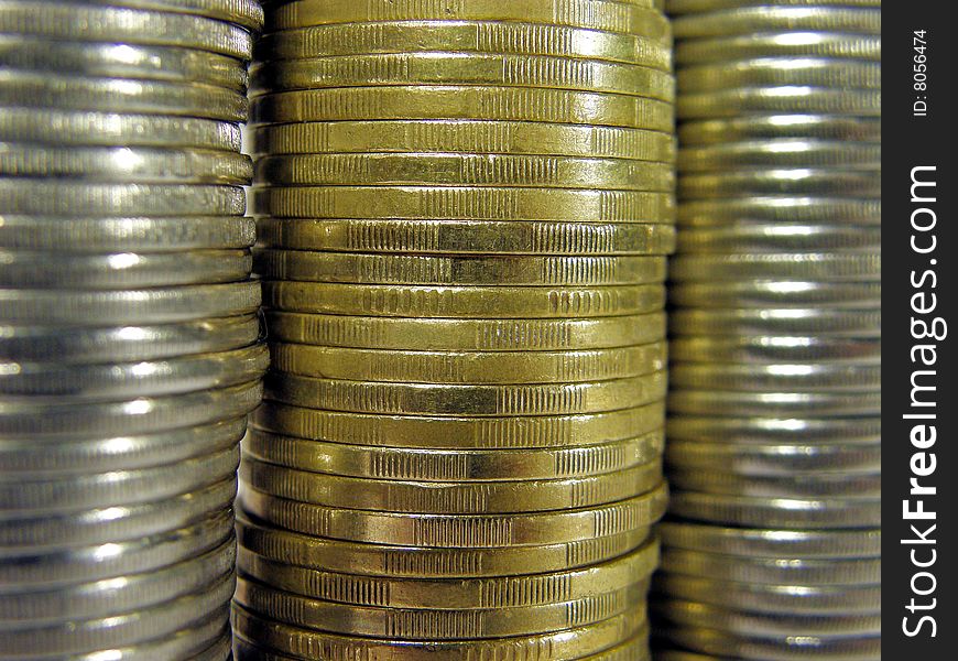 Pile folded coins. Coins stock